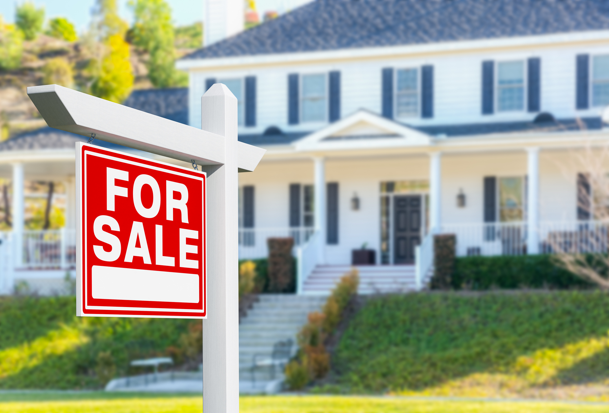 For Sale Real Estate Sign in Front of New House. For Sale Real Estate Sign in Front of New House.